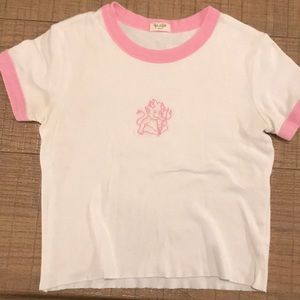 White top with pink trim